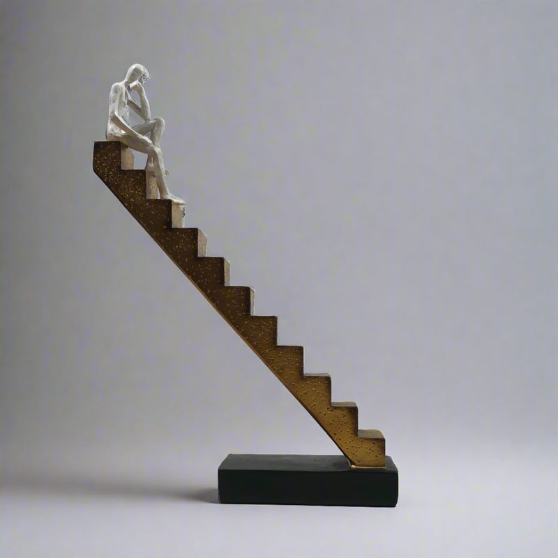 Resin Man Statue on Stairs